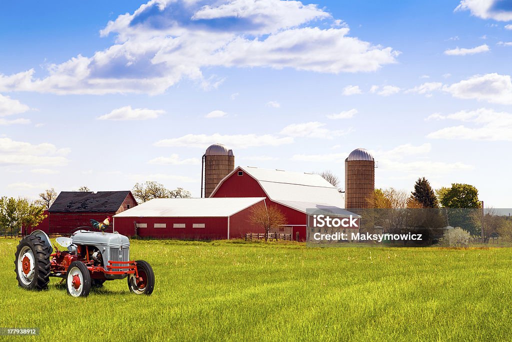 Traditional american red farm with tractor